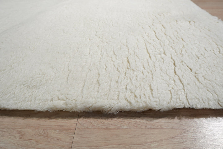 Ivory Contemporary Solid Color Modern Solid Area Rug