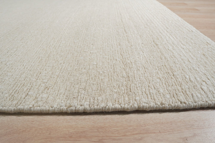 Ivory Contemporary Solid Color Plush flatweave Loom Area Rug